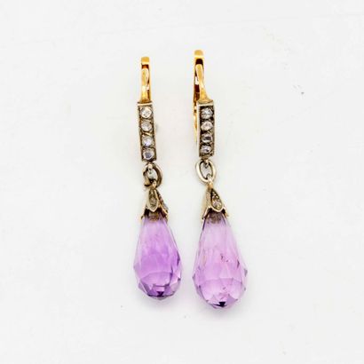 null Yellow gold earrings with amethyst drops, the clasp with small pink diamonds

Gross...