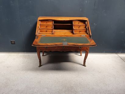 null Sloping desk in fruitwood veneer with frieze decoration. It opens with a flap...