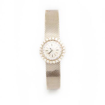 LONGINES LONGINES

Ladies' watch in white gold, flexible gold bracelet, diamond-set...