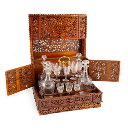 null Liqueur cabinet with a natural wood structure with complex interlacing patterns,...