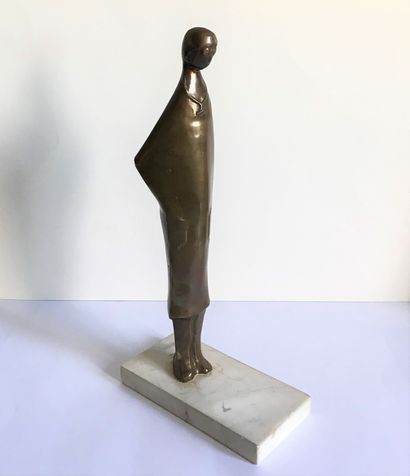 null CONTEMPORARY SCHOOL

Standing figure

Bronze with golden patina

Rectangular...