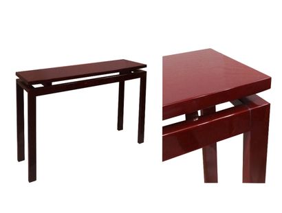 null Rectangular console in burgundy lacquered wood. The top slightly raised from...