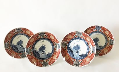 CHINE CHINA

Set of four porcelain plates with landscape decoration and red and gold...