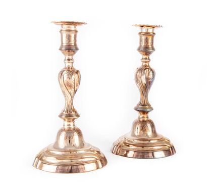 Pair of candlesticks in re-silvered bronze,...