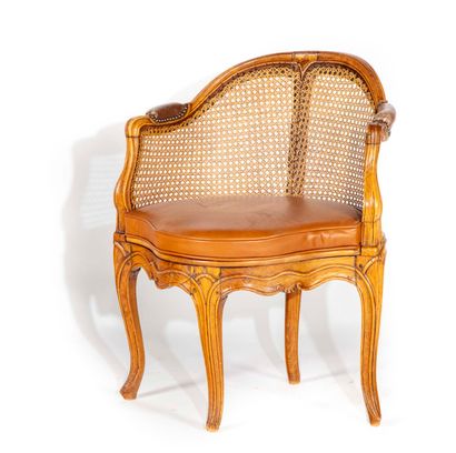 null Elm molded caned desk armchair, resting on cambered legs arranged in a diamond...
