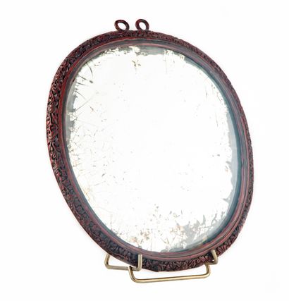 CHINE CHINA - 19th century

Oval mirror in cinnabar red lacquer decorated with two...