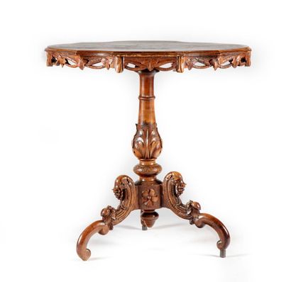 null Violin pedestal table with a central tripod shaft carved and moulded, the top...