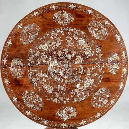 null Beautiful pedestal table in exotic wood richly inlaid with mother-of-pearl motifs...