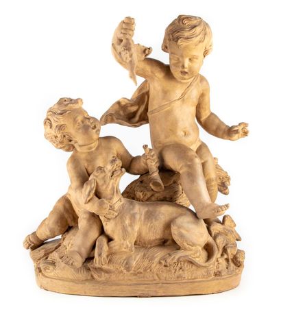 A terracotta group of children playing with...