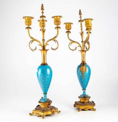 Pair of porcelain and gilt brass torches...