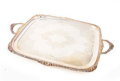 null Silver serving tray with engraved decoration and molded border of gadroons and...