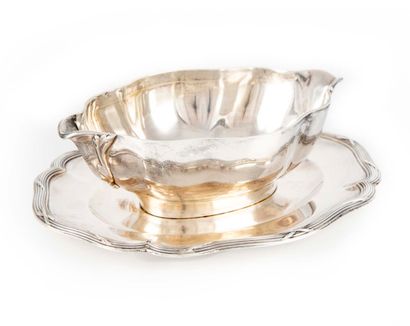 CARDEILHAC House of CARDEILHAC

Sauceboat and its tray in silver, Minerve mark, with...