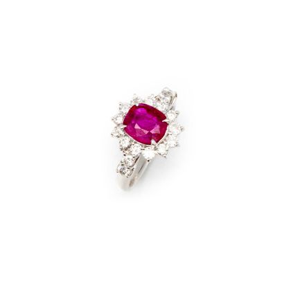 White gold ring set with a Burmese ruby weighing...