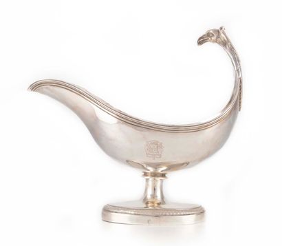 null Sauce boat on pedestal in plain silver. Chiseled take of an eagle head and acanthus...