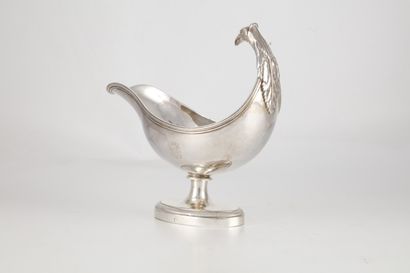 null Sauce boat on pedestal in plain silver. Chiseled take of an eagle head and acanthus...