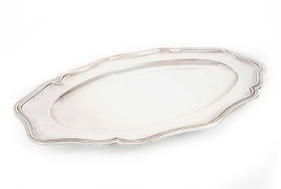 null A large oval dish with a curved edge, fillets and contours in silver plated...
