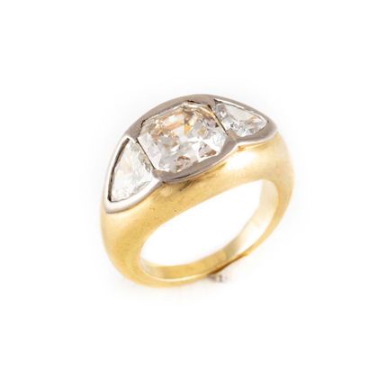 Yellow gold pavement ring with a cushion-cut...
