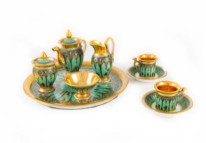 PARIS PARIS

Porcelain cabaret with brown and gold decoration on a green background...