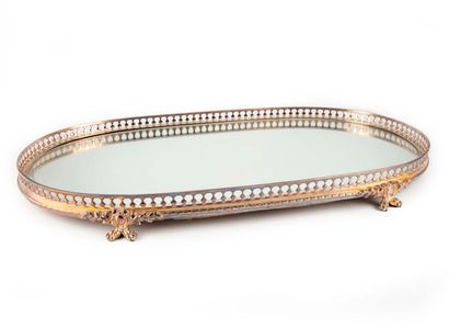 null Oval table top in silvered bronze with a mirror background. Openwork border....