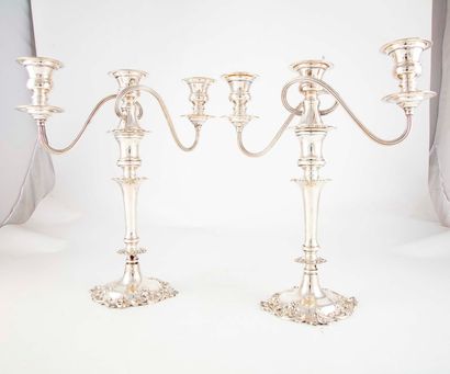 null Pair of large candlesticks that can be used as three-branched torches in sterling...
