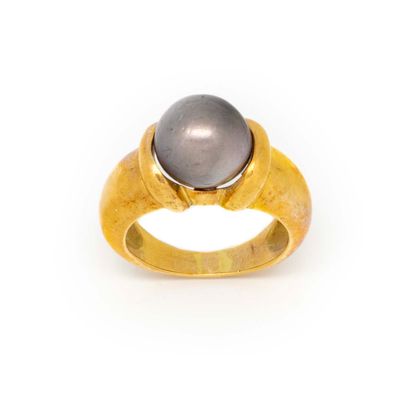 null Yellow gold ring with a Tahitian pearl

TDD : 55 

Gross weight : 12 g.