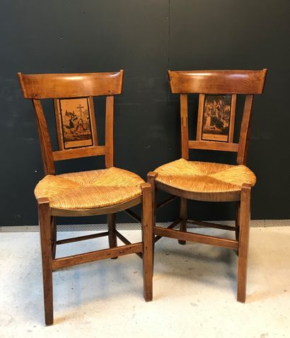 null Two straw chairs in natural wood. The back with a central panel decorated with...