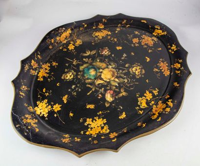 null Large black paper tray with polychrome and gilded flowers

Napoleon III period

H....