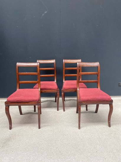 null Suite of four chairs in natural wood with a reversed back and bars

Restoration...