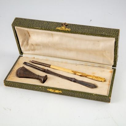 null Writing set including two penholders and a stamp. 

With case