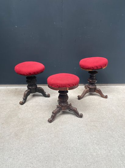 null Three tripod piano stools in carved wood 

46x34cm

Accidents and missing p...