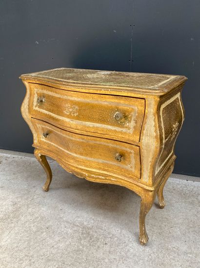 null A small chest of drawers with two drawers in gilded and patinated wood in the...
