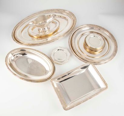 null Important set of silver plated serving pieces with chased border of ribboned...