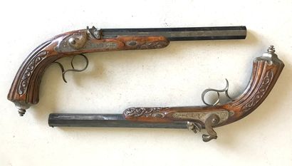 null Pair of percussion pistols with blued and fluted octagonal barrels, marked in...