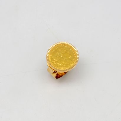 null Yellow gold ring set with a 20 Francs gold coin

Weight : 8,30 g.
