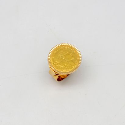 null Bague en or jaune ornée d'une pièce de 20 Francs or

Poids : 8,30 g.