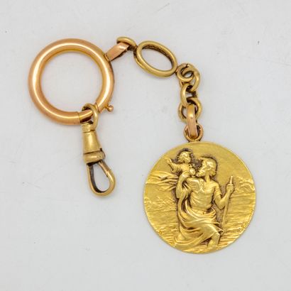 null Médaille en or jaune et chaîne de montre

Poids : 13,5 g.