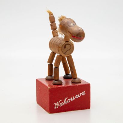 WAKOUVA Wakouwa

Figurine articulée en bois peint figurant un zèbre

Estampillée...