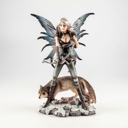null Figurine en résine polychrome représentant une fée avec un arc et un loup

H.:...