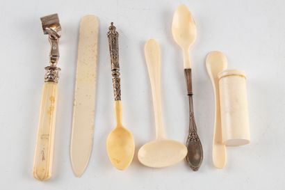 null Lot including :

Two boiling spoons, ivory spoon and silver handle 

Silver...