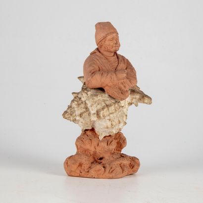DEGOUY DEGOUY

Terracotta subject representing a fisherman in a shell

Signed

H.:...