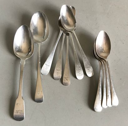 null Set of five silver spoons with engraved inscription on the spatula. 

Two large...