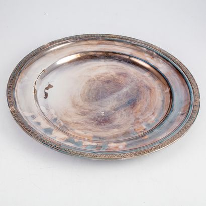 null Round silver plated dish decorated with a frieze of water leaves. Empire style

Diameter...