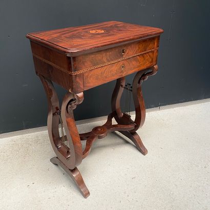 null Veneer work table, the top decorated with a rose inlay revealing a mirror and...
