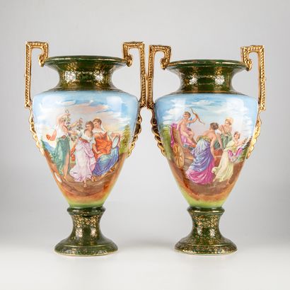 null A pair of polychrome ceramic vases decorated with antique scenes and golden...