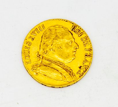 A 20 francs Louis XVIII coin

Dated 1815,...