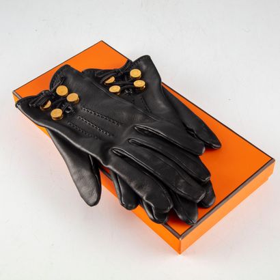 HERMES HERMES - Paris

Pair of black lambskin gloves, finished with four gold metal...