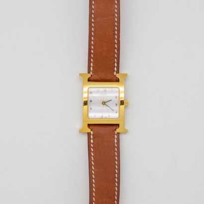 HERMES HERMES - Paris

Square "Heure H" wristwatch in gilt metal, white radiating...