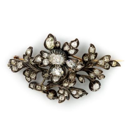 null Silver and gold brooch set with old-cut diamonds and foliage

19th century

Gross...