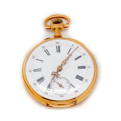  Yellow gold (750 thousandths) man's pocket watch engraved on the back with a leafy...