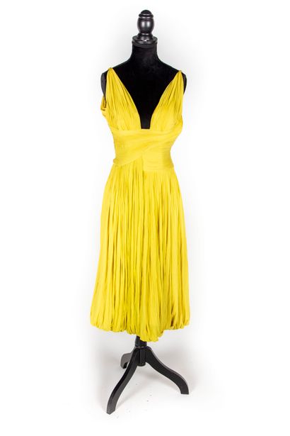 GRES Maison GRES - Paris 

Cocktail dress in yellow silk jersey, asymmetrical pleated...